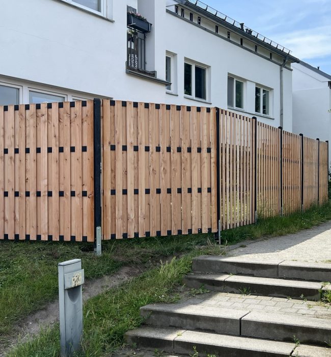 alt="Green Team – Pflege und Wartung von Sichtschutzzäunen in Berlin"